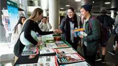 Photograph of a clubs information table in the Kelburn campus Hub