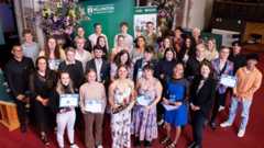 A group photo showing all recipients of the 2022 Blues Awards posing with the Acting Vice-Chancellor