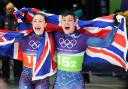 Tabby Stoecker and Matt Weston celebrate their gold medal (Andrew Milligan/PA).