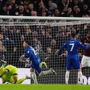 Chelsea's Enzo Fernandez celebrates scoring their side's third goal of the game during the Premier League match at Stamford Bridge, London.