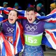 Tabby Stoecker and Matt Weston celebrate their gold medal (Andrew Milligan/PA).