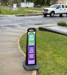 A temporary bus stop sign for the Yamhill County Transit bus.