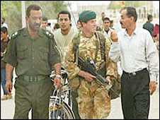 British soldiers on patrol with Iraqi police