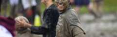 Students enjoy playing volleyball in the mud during Oozefest.