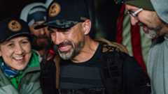 Split image of Mark running and getting emotional as he breaks the record