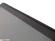 Two dual-array microphones are located next to the 720p webcam in the frame.