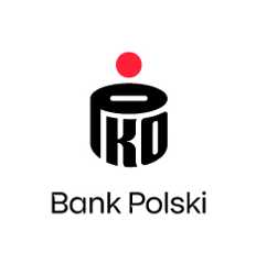 PKO BP S.A. Duże litery PKO układają się w kształt walcowatej skarbonki. W literze P jest dziurka, przez którą wpadają do skarbonki monety. Nad skarbonką wisi czerwone koło symbolizujące monetę. Pod skarbonką widać napis Bank Polski ułożony z czarnych liter.
