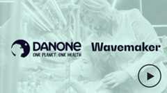 Danone, The Trade Desk and Waver maker logos over a green image of a woman and child