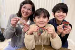 Three kids with their heart necklaces