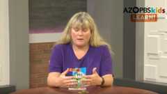 Mitsy doing a letter identification activity