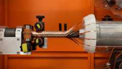 Manufacturing of superconducting cables involves precision winding of HTS tapes around the core of the future cable