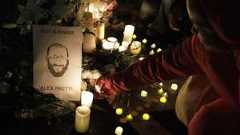 epaselect epa12689532 Protesters during a demonstration and vigil against the shooting of Alex Pretti by ICE agents, outside the Veterans Affairs (VA) Headquarters in Washington, DC, USA, 28 January 2026. Nationwide protests continue after federal immigration operations in Minneapolis resulted in the fatal shootings of two US citizens, Renee Nicole Good and Alex Pretti. EPA/WILL OLIVER