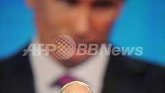 「反逆者はどこだ?」プーチン露首相、党大会の反対1票に