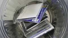 How to Make a Folded-Paper CD Case » Curbly | DIY Design Community « Keywords: folded, paper, cd, case