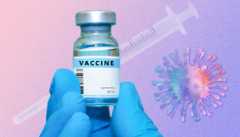 vaccines after 50 gloved hand holding a vaccine vial with a syringe in the background