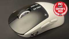 A Logitech G Pro X2 Superstrike gaming mouse on a mouse pad with a PC Gamer Editor's Pick label overlayed.