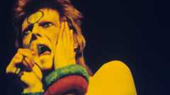 LONDON - MAY 12: David Bowie performs live on stage at Earls Court Arena on May 12 1973 during the Ziggy Stardust tour (Photo by Gijsbert Hanekroot/Redferns)