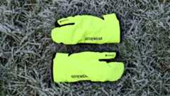 A pair of fluoro GoreWear gloves