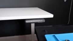 An Autonomous SmartDesk 5 being put together and installed in an office.