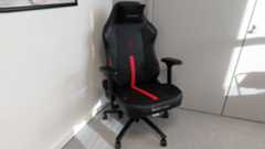 The XL edition of the DXRacer Martian gaming chair as seen in a sunny meeting room.