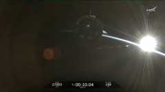 SpaceX Crew-12 Dragon flies free over the Earth during a sunrise