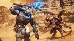 An Ultramarine prepares to whack a Tyranid with a power axes in Space Marine 2