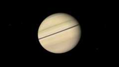 A photo of Saturn in the darkness of space with its rings stacked together