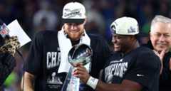 Seattle Seahawks quarterback Sam Darnold (14) and running back Kenneth Walker III (9)