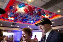 Pa. Sen. Doug Mastriano greets his supporters with his wife Rebecca, left, at his watch party held at The Orchards in Chambersburg on May 17, 2022.Joe Hermitt | jhermitt@pennlive.com