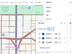 The same Seattle map but with zoom level styles added at 12 and 17 so that thecolors of the blue highway fade into the beigesurface.
