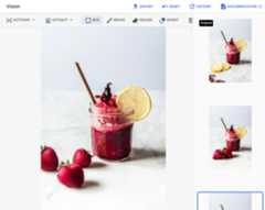 A screenshot from a generated edit of a glass jar containing a red liquid. In this screenshot, the lemon slices previously in the image foreground are replaced by three strawberries just to the left of the jar.