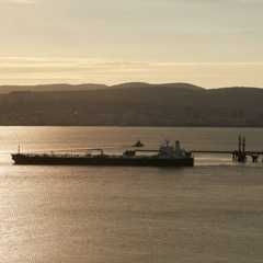 Filling a tanker at an oil port