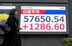 FOCUS: Selling of yen, bonds to continue after LDP's huge Japan election win
