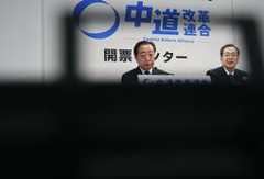 FOCUS: Japan's main opposition in fight for survival after election rout