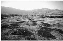 Figure 2. Necropolis Rabat I. Modern and ancient tombs. Nomad monuments survive to a lesser extent in Uzbekistan, because the develop- ment of land for cultivation included the area of foothills where necropolises were ocated, so that they have been destroyed. Such destruction has also occurred in more urban areas. Some idea of what has been lost is provided by the site of Airtam, 18 km o the east of modern Termez. Apart from the remains of monumental buildings dec- orated with stone reliefs, burials have been found here which can be linked to nomad culture. The construction and funerary finds of the Airtam burials are very similar to hose of the Tulkhar necropolis (Turgunov 1973, 64-8). Two types of burials are found at the Airtam necropolis: a rectangular grave and a podboy (oriented north-south). The finds included a double-blade dagger (35 cm in length), three iron rings and an arrow- head. The pottery and other finds from the funerary complex show close analogies with the material from Tulkhar, Aruktau and elsewhere. The necropolis of Airtam can be dated to the second to first century BC. Ao smectic alesse 4 bese ch eel aeacceanewwwndee Gal OT Teg ke cc iseadicews “Gere ‘hese: eee | eh Tee