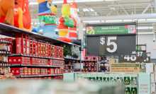 A Walmart aisle decorated in holiday decor