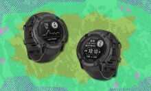 the Garmin Instinct 2X Solar in two positions on a green background