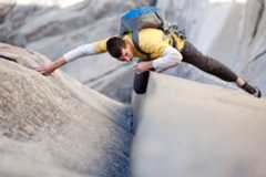 a rock climber climbing