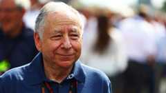 Jean Todt smiles in the Formula 1 paddock before the 2024 Italian Grand Prix