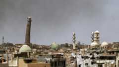 Mosque's minaret (pictured left) in Mosul on 24 May 2017
