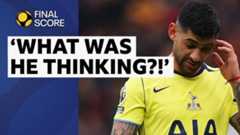 Cristian Romero scratches his head after being sent off at Old Trafford