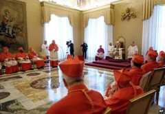 Pope reads his resignation letter to gathering of cardinals