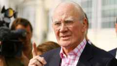 Menzies Campbell campaigning. The photo shows him with his finger pointing into the air as he emphasises a point