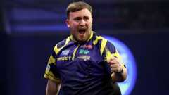 Luke Littler celebrates