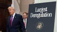 US President Donald Trump arrives to make an announcement at the White House