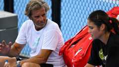Francisco Roig chatting with Emma Raducanu