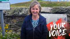 A woman with medium length blondish brown hair
