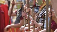 Roman soldiers holding weapons