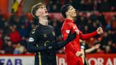 Hearts' James Wilson is left dejected at Pittodrie