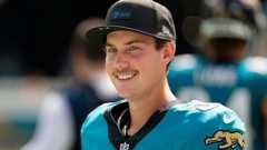 Jacksonville Jaguars kicker Cam Little smiles as he walks the field during an NFL game against the Houston Texans